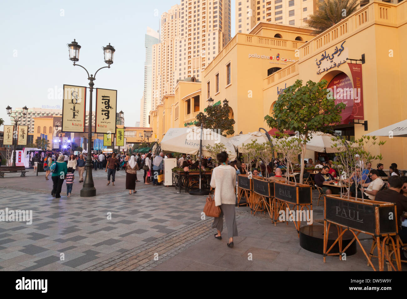 People on The Walk in the evening, Jumeirah Beach Residences ( JBR ), Dubai, UAE, United Arab Emirates, middle East Stock Photo