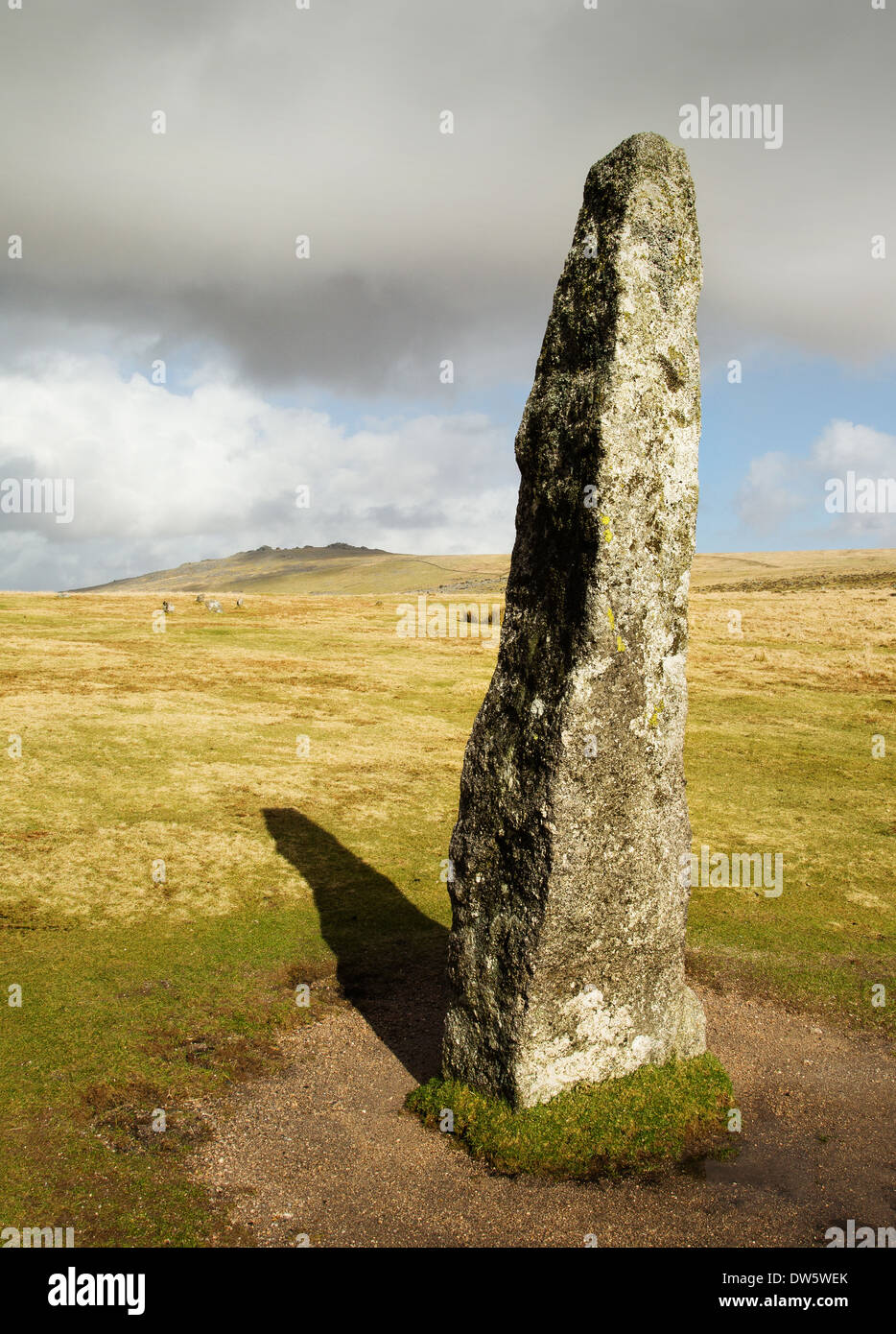 Bronze Age standing stone at Merrivale Dartmoor UK with Great Mis Tor