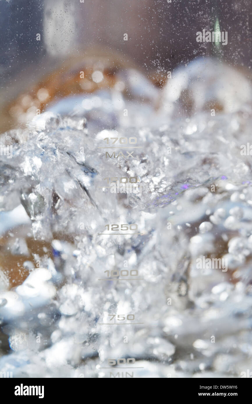 boiling water in glass electric kettle close up Stock Photo