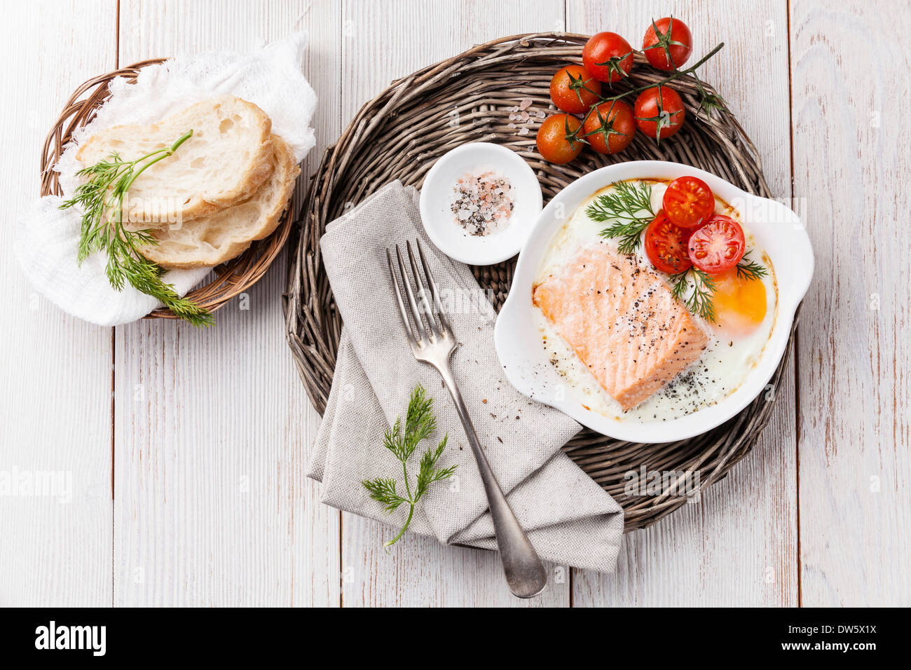 Baked salmon with eggs for breakfast Stock Photo