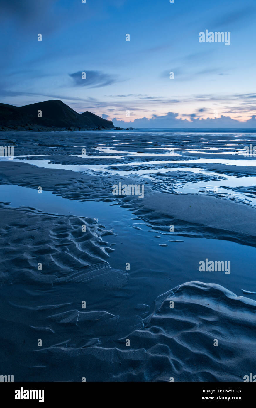Low tide on Crackington Haven Beach during twilight, Cornwall, England. Summer (August) 2013. Stock Photo