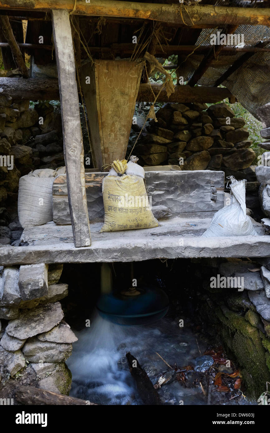 Water powered grinding mill in the Gorkha region of Nepal. Stock Photo