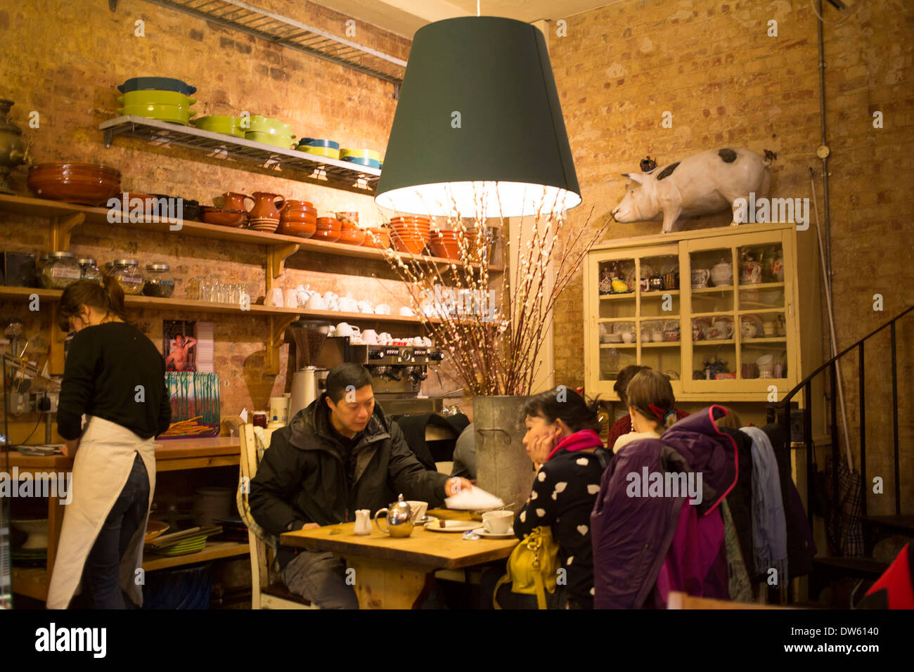 Interior of Patisserie Lila in Borough Market, London, UK. A traditional yet ecclectically decorated cafe. Stock Photo