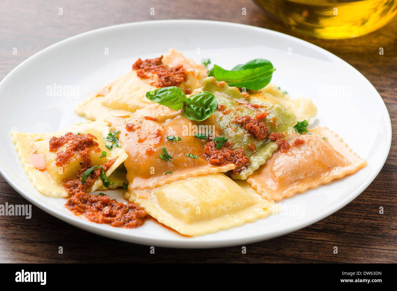 Ravioli pasta with red tomato sauce Stock Photo