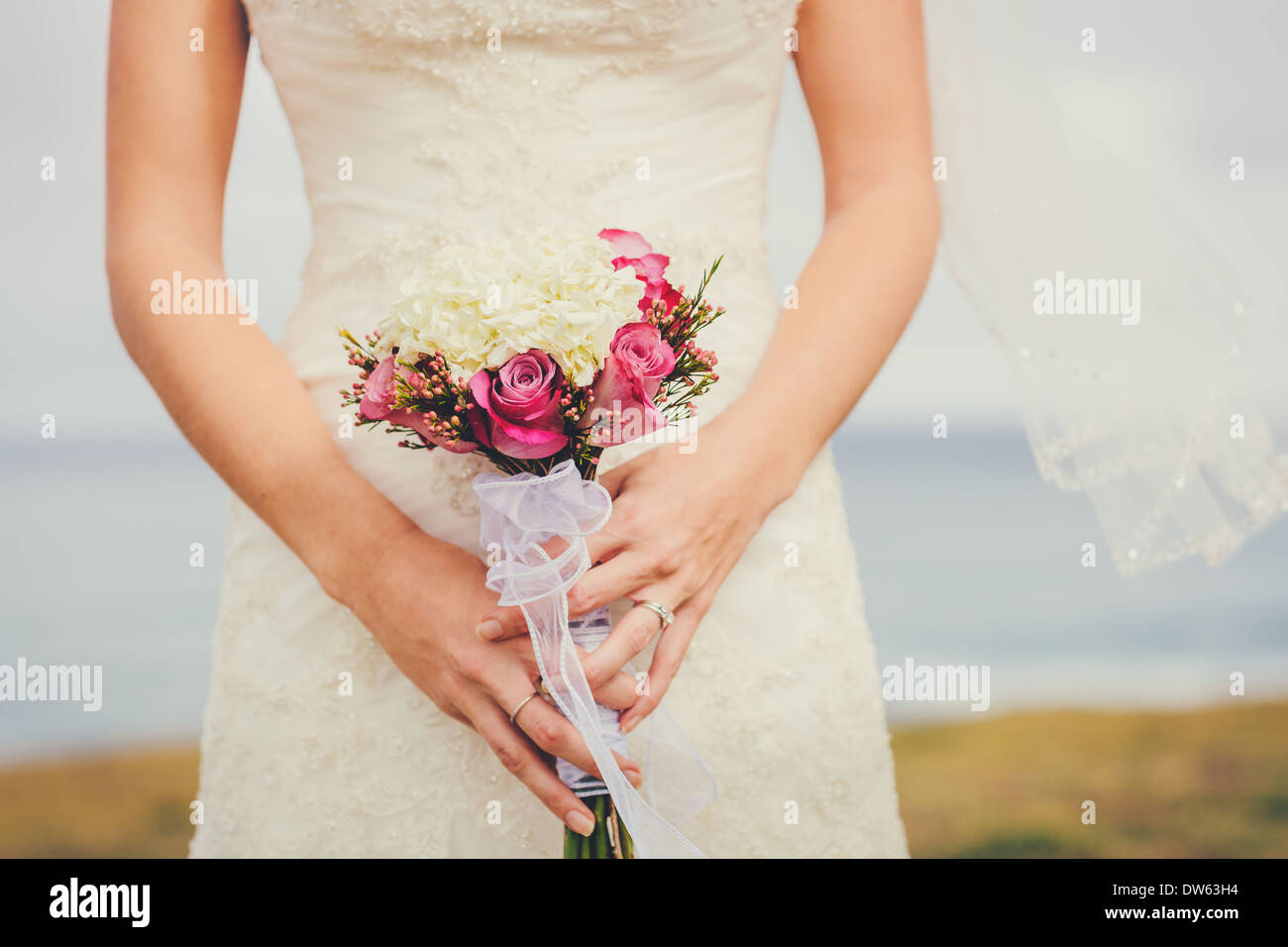 Beautiful Bride, Holding Flower Bouquet. Wedding. Stock Photo