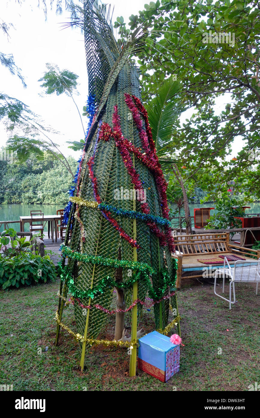 Tropical Christmas tree at the Blue Lagoon Bungalows & Restaurant on Koh Chang Island, Thailand. Stock Photo