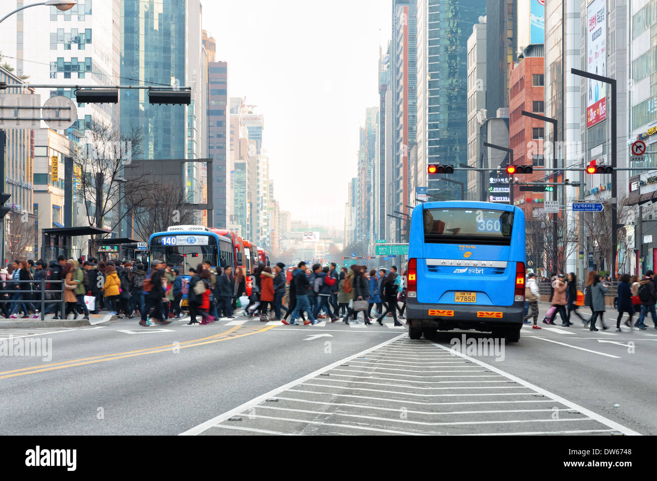 Pedestrians Cross The Street In The Gangnam District Of Seoul, South ...