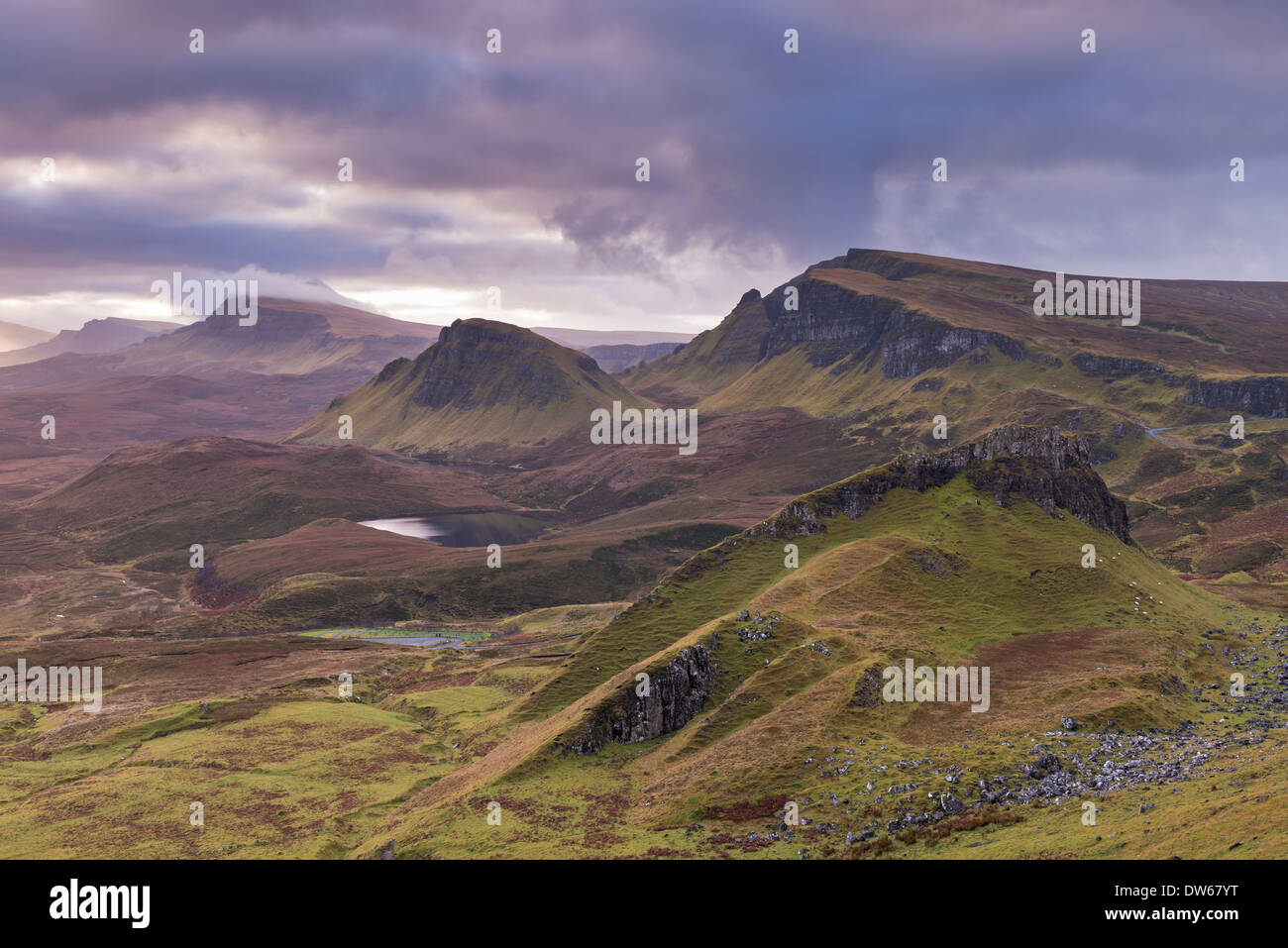 Dawn over the Trotternish mountain range, viewed from the Quiraing, Isle of Skye, Scotland. Winter (December) 2013. Stock Photo