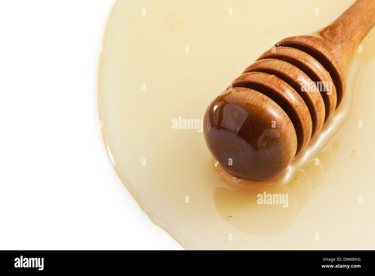 honey and stick isolated on white background Stock Photo - Alamy