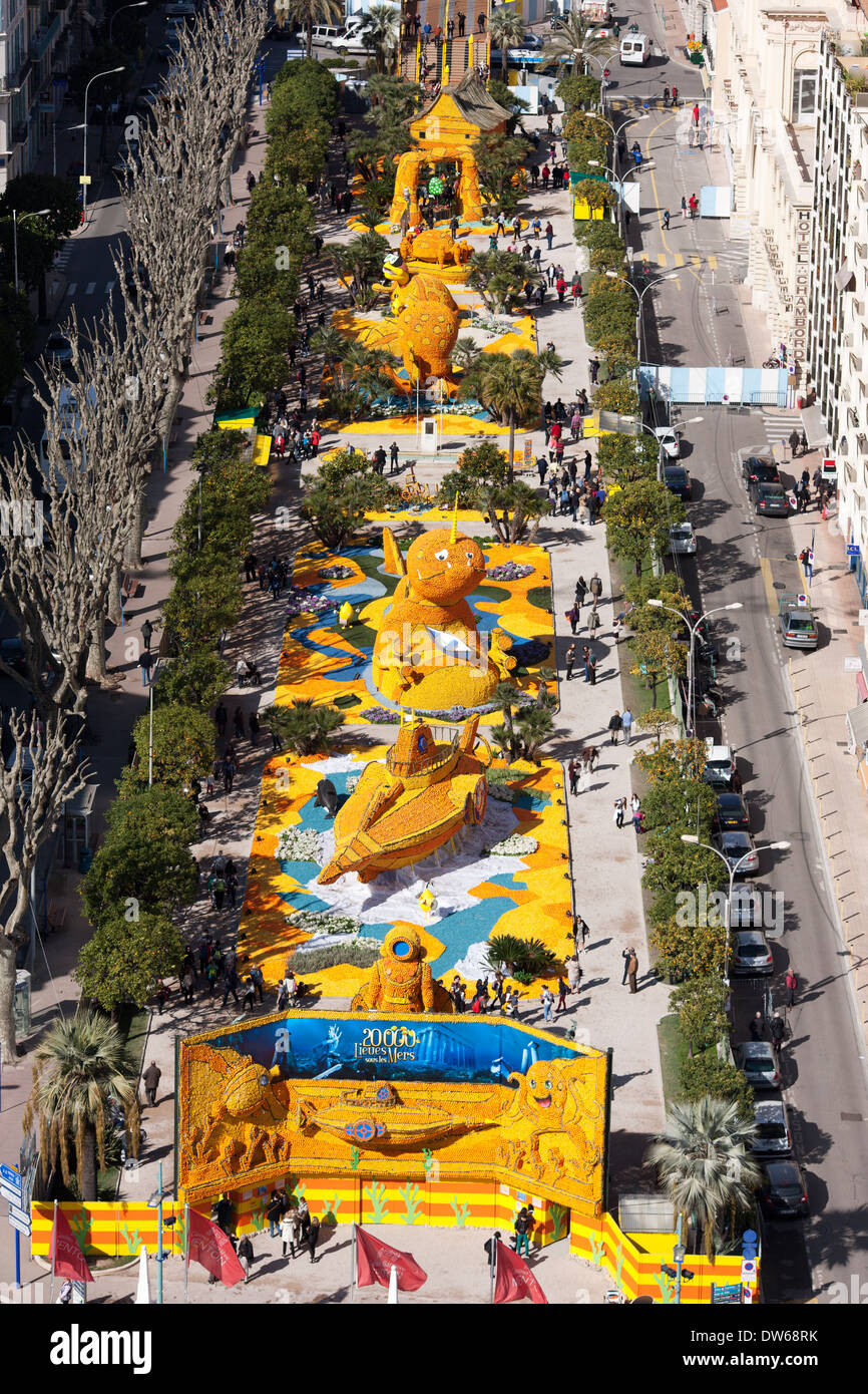 AERIAL VIEW. Lemon festival of Menton in 2014. '20000 leagues under the sea' theme built with lemons and oranges. French Riviera, France. Stock Photo