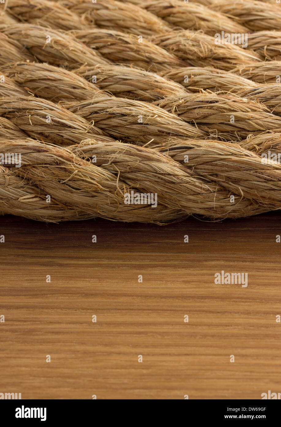 ship ropes on wooden background Stock Photo
