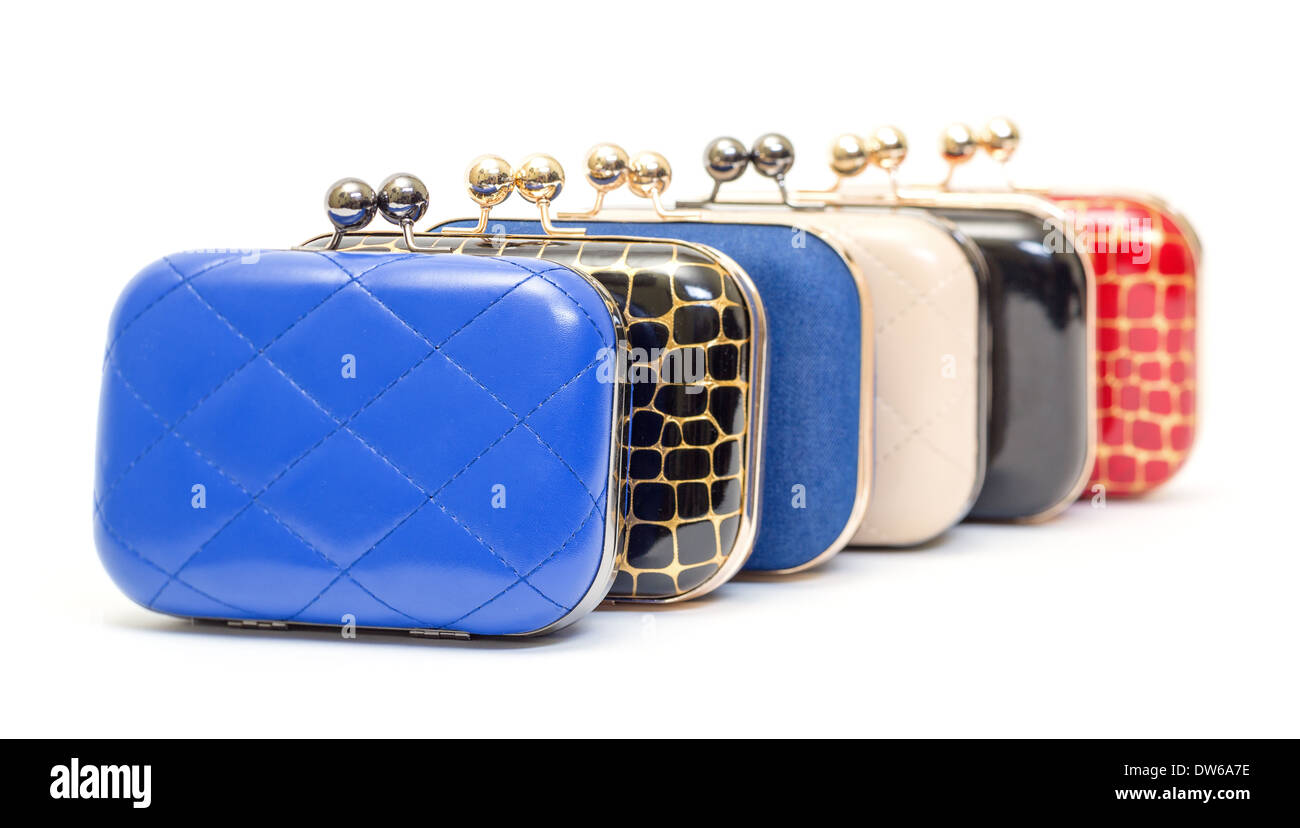 Set of fashionable female handbags on white background Stock Photo