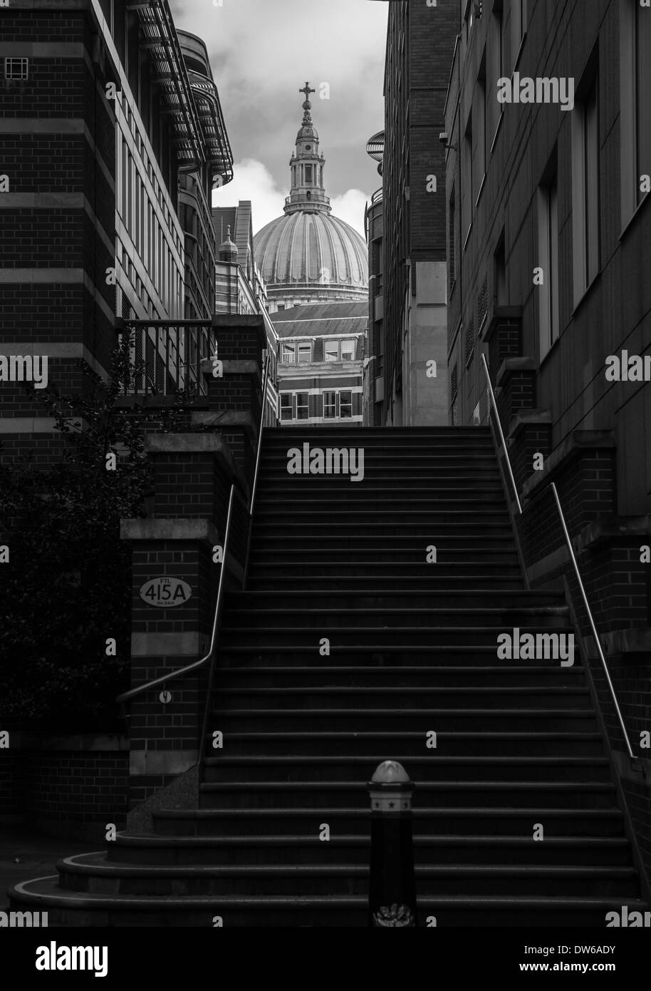 A flight of stairs leading up to a view of St Paul's Cathedral. Stock Photo