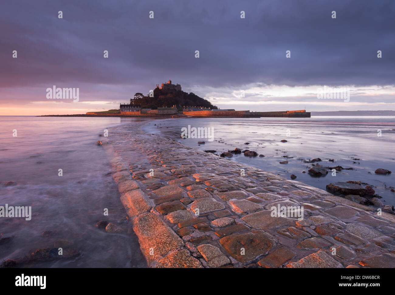 St Michael's Mount and the Causeway at dawn, Marazion, Cornwall, England. Winter (January) 2014. Stock Photo