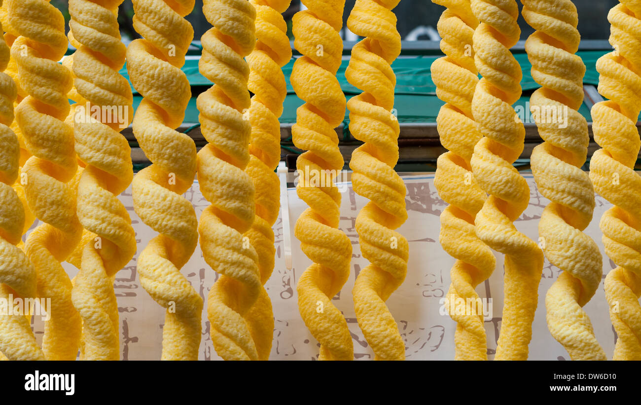 These strange looking snack items hang from a street vendor in Insadong, Seoul. Stock Photo