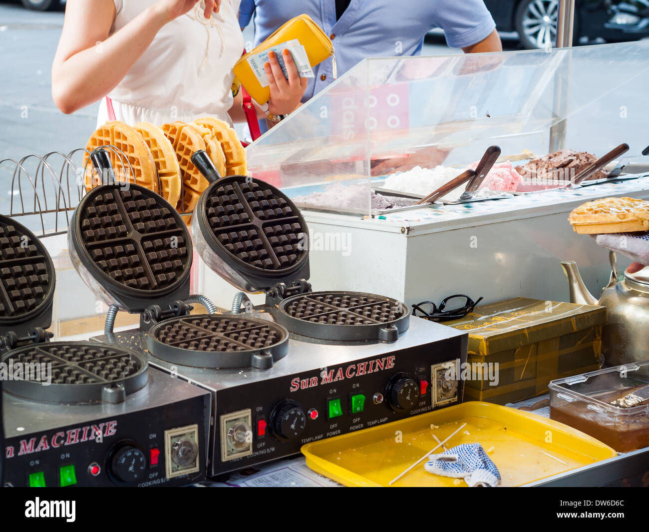 A street vendor in Insadong, Seoul, sells waffles and icecream. Stock Photo