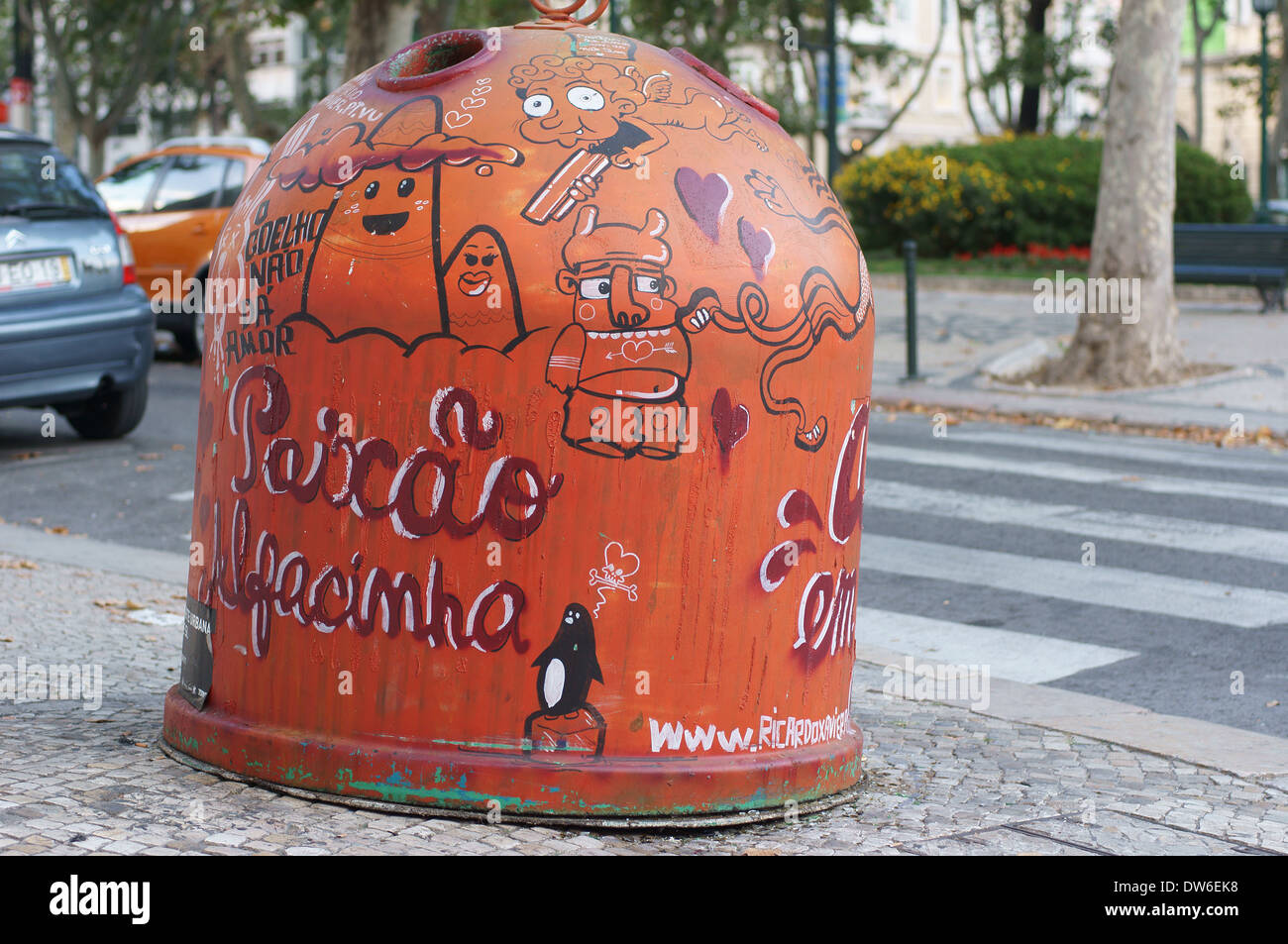 Graffitti painted waste bin  Lisbon Portugal Stock Photo