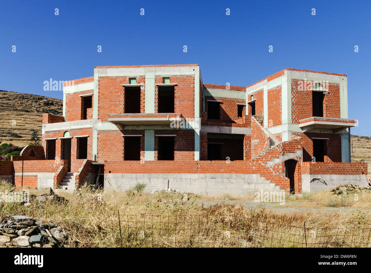 Unfinished holiday houses in Greece Stock Photo