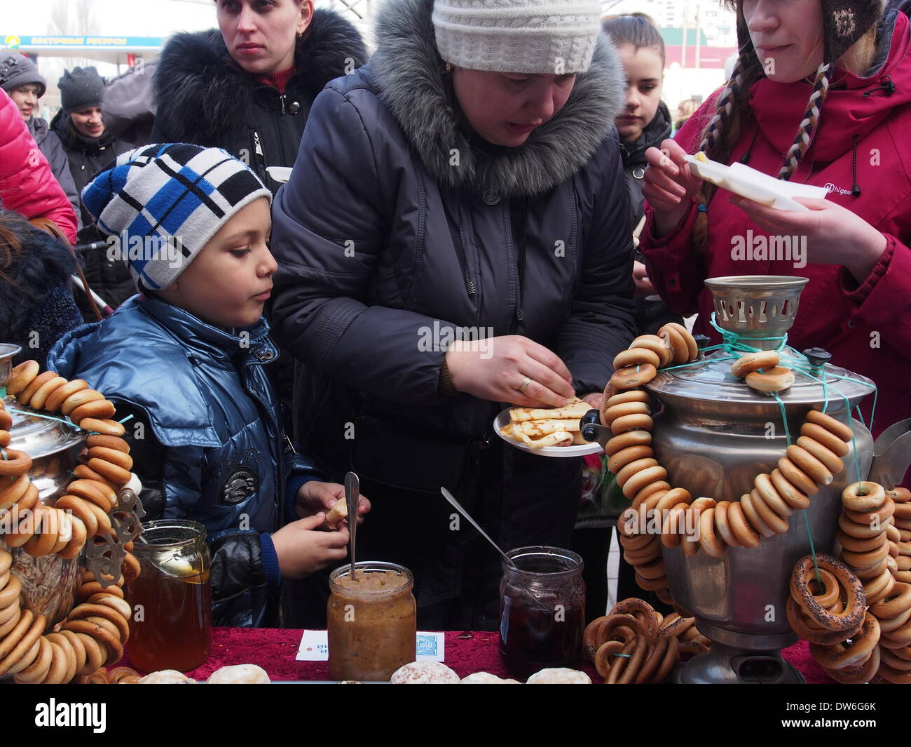 Lugansk, Ukraine. 1st March, 2014. Maslenitsa or Pancake Week is the only purely Slavic Holiday that dates back to the pagan times. This is the celebration of the imminent end of the winter which the Orthodox Church has accommodated as a week of feasting before Great Lent. Credit:  Igor Golovnov/Alamy Live News Stock Photo
