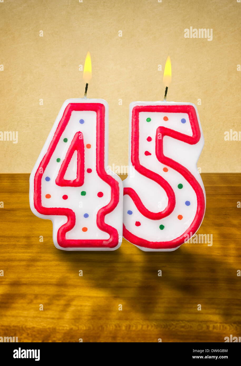 Burning birthday candles number 45 Stock Photo - Alamy
