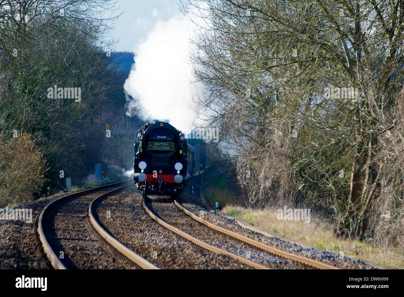 Brockham, Dorking, Surrey. Saturday 1st March 2014. The VS Orient Express Steam Locomotive BR(S) Merchant Navy Clan Line Class 4-6-2 No 35028 'Luncheon Excursion' speeds through the Surrey Hills in Surrey, 1500hrs Saturday 1st March 2014 en route to London Victoria. Credit:  Photo by Lindsay Constable/  Alamy Live News Stock Photo