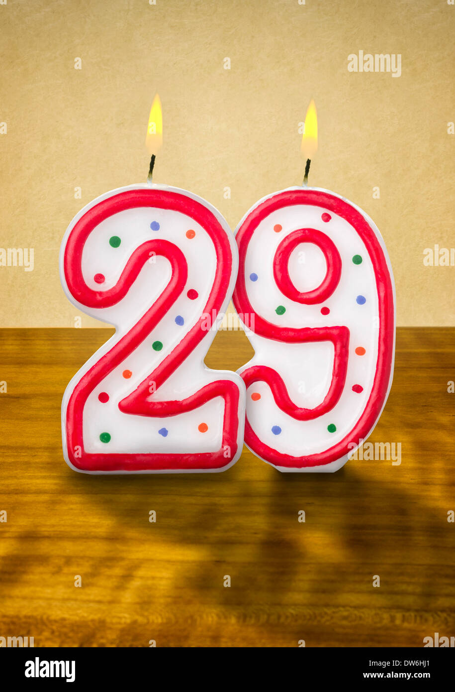 Burning birthday candles number 29 Stock Photo