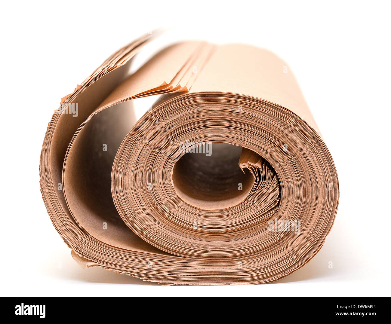 Twisted into roll brown wrapping paper on white background Stock Photo