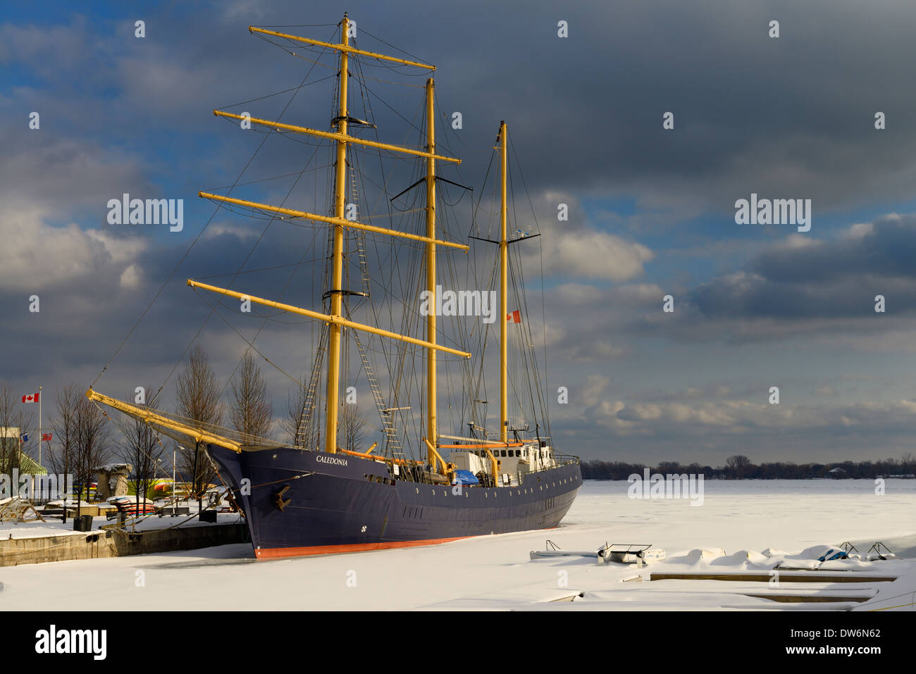 Newly retrofitted Caledonia tall ship locked in ice and snow in the Toronto Harbour Lake Ontario Stock Photo