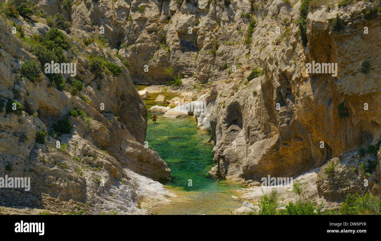 Rural swimming in French gorge. Gorge swimming off beaten track. Stock Photo