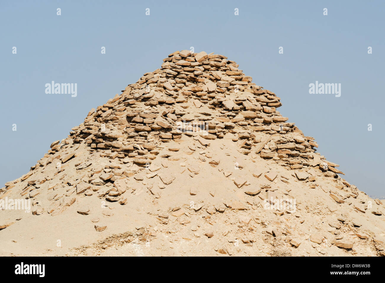 The Pyramid of Userkaf near the Step Pyramid of Djoser in Saqqara, Egypt. Stock Photo
