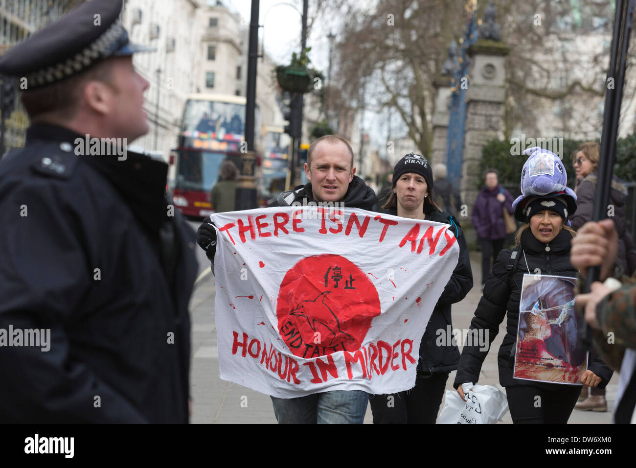 Protest against the slaughter of dolphins and small whales in Taiji, Japan, outside the Japanese Embassy, London, UK Stock Photo