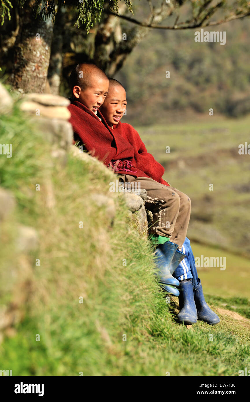 Schoolboys wearing traditional clothes, village of Sakteng, Eastern ...