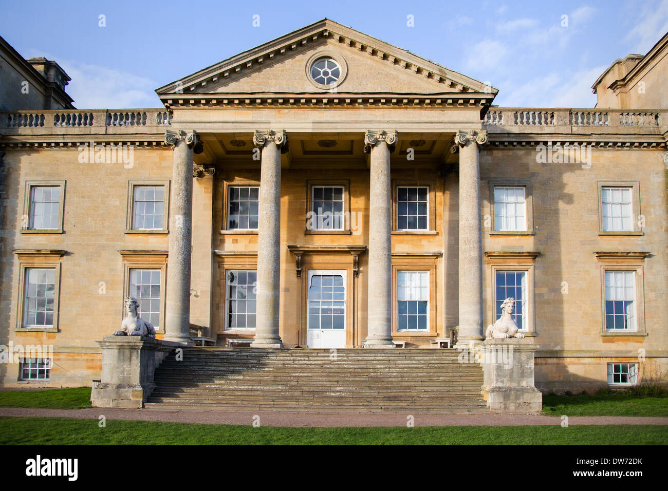 South portico of Croome Park in Worcestershire with broad steps flanked by sphinxes Stock Photo