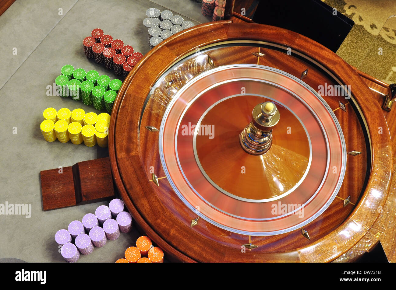 image with a casino spinning roulette wheel with the ball Stock Photo