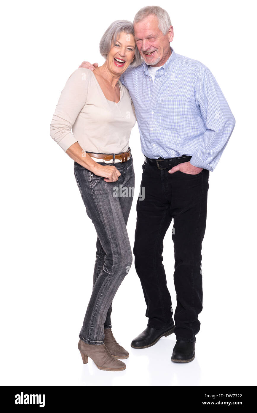 Smiling senior couple in front of white background Stock Photo
