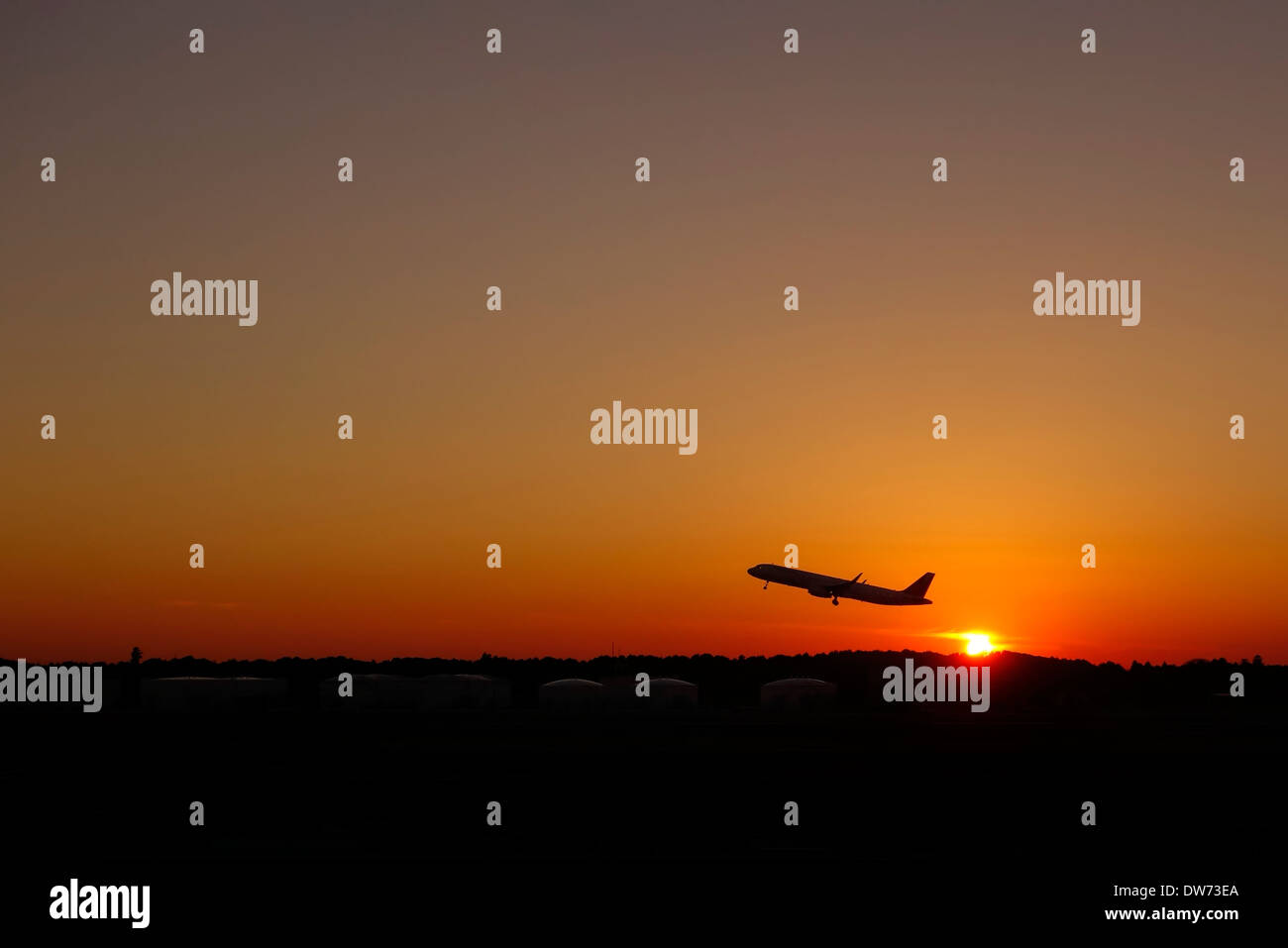 Jet taking off from Tokyo's Narita International Airport at sunset, Japan. Stock Photo