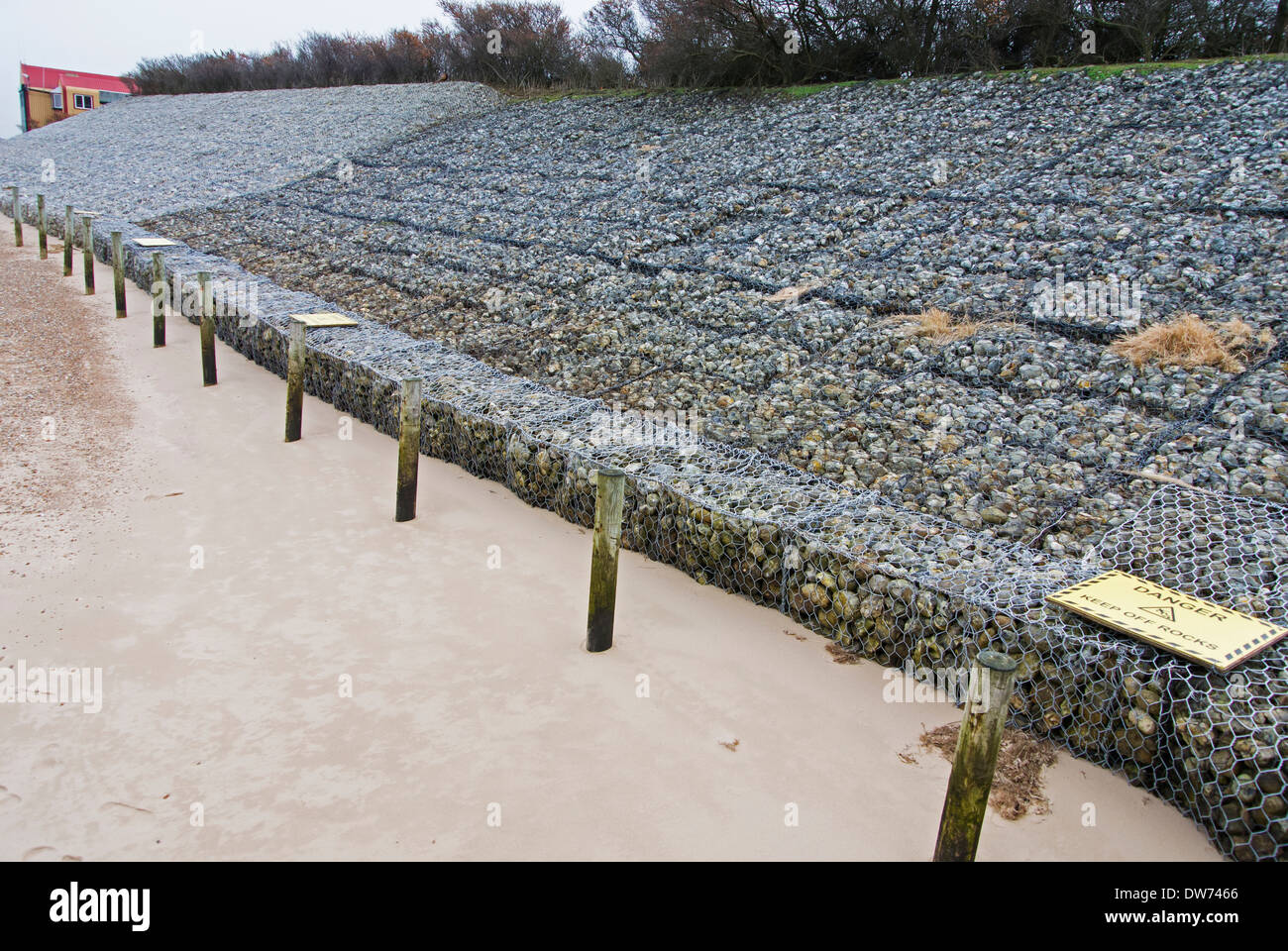 Stone filled wire frame sea defences, Wells-next-the-sea, Norfolk, England Stock Photo