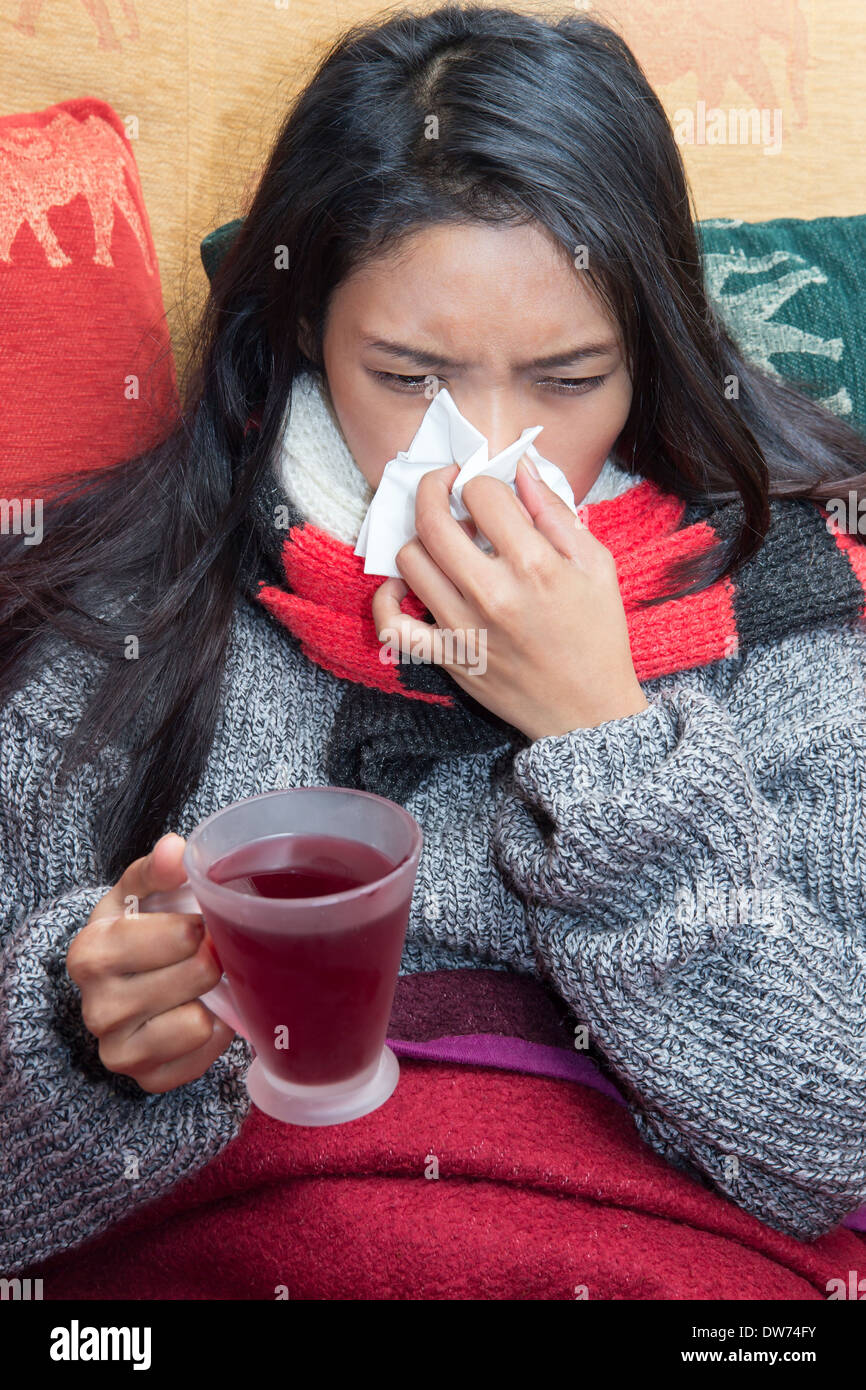 sick woman drinking tea Stock Photo Alamy