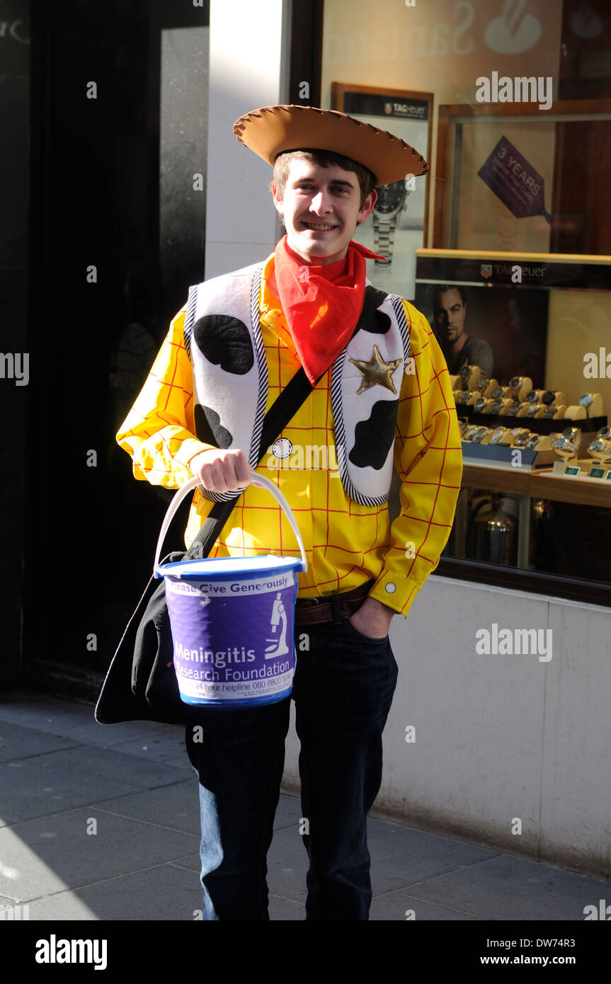 Collecting For Charity ,Man Dressed Has Woody from Toy Story . Stock Photo