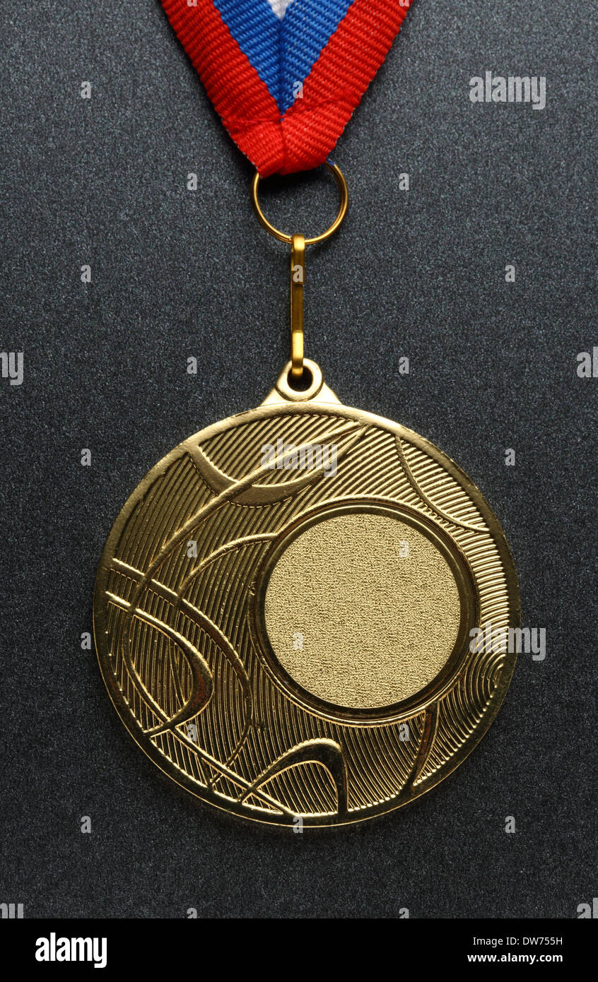 Metal medal on scratchy background Stock Photo - Alamy