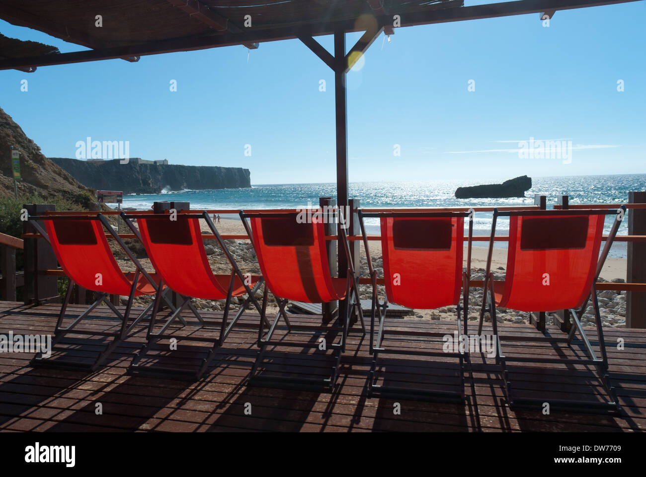Deck chairs at a beach bar at Praia do Tonel in Portugal's Algarve region. Stock Photo