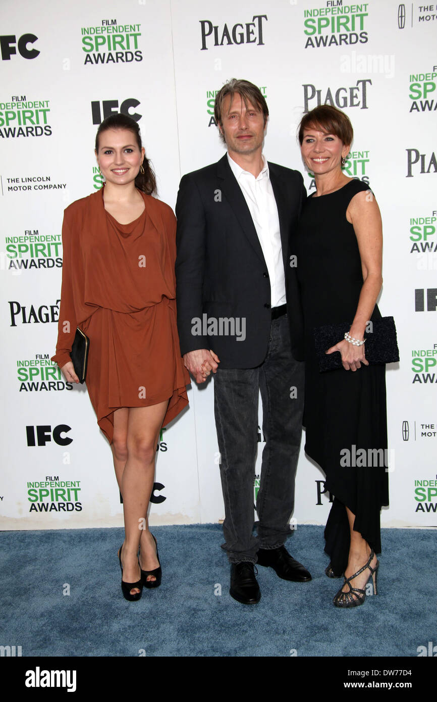 Actor Mads Mikkelsen, Viola Mikkelsen (l) and Hanne Jacobsen (r) attend the  Film Independent Spirit Awards at Santa Monica Beach in Los Angeles, USA,  01 March 2014. Photo: Hubert Boesl/dpa - NO
