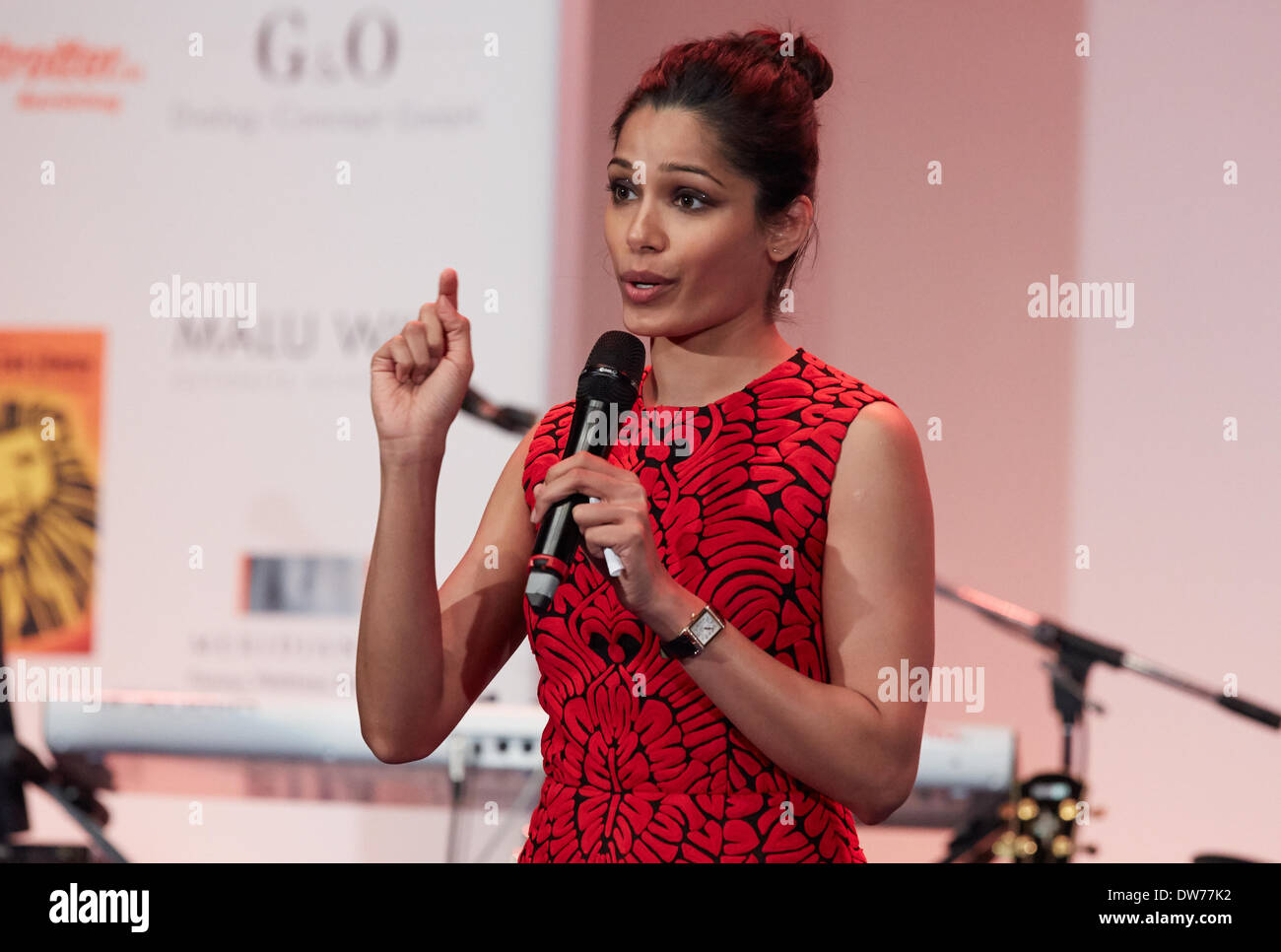 Indian actress Freida Pinto delivers a speech on stage during the charity event celebrating the 25th anniversary of the German chapter of the international children's aid organisation 'Plan International' in Hamburg, Germany, 1 March 2014. Photo: Georg Wendt/dpa Stock Photo