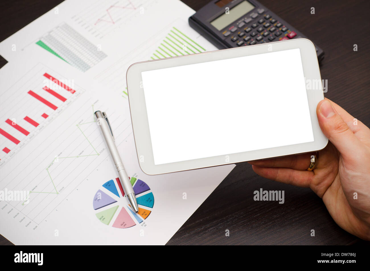 Tablet pc with empty white screen. Modern workplace in office Stock Photo