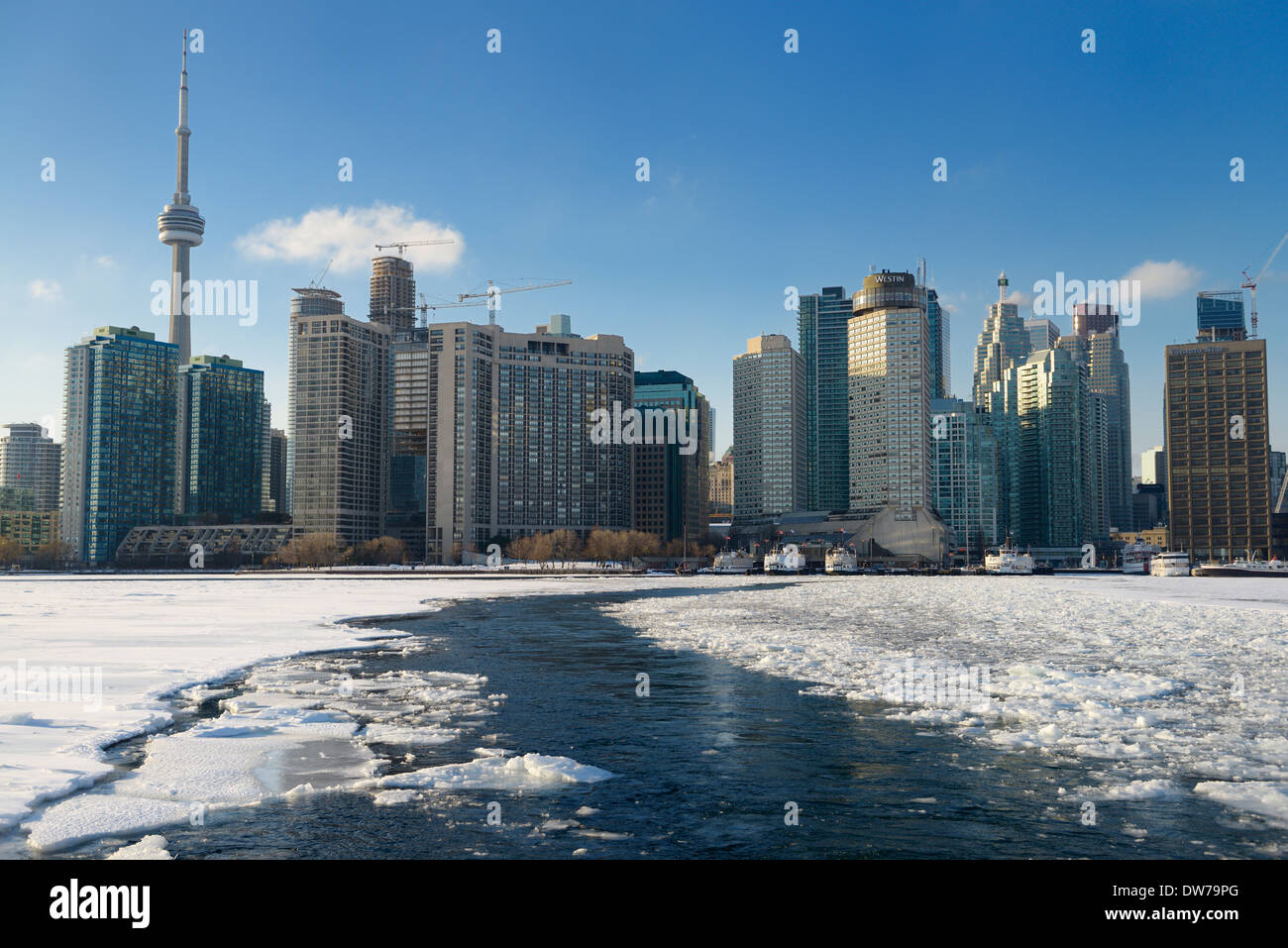 Ice breaking path of Wards Island Ferry on frozen Lake Ontario in Toronto Canada winter Stock Photo