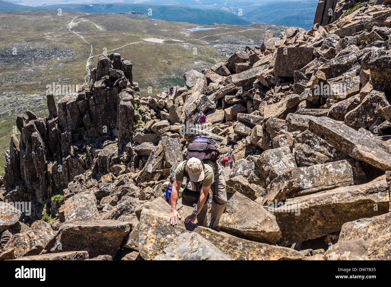 Hikers climbing Cradle Mountain in Tasmania Stock Photo Alamy