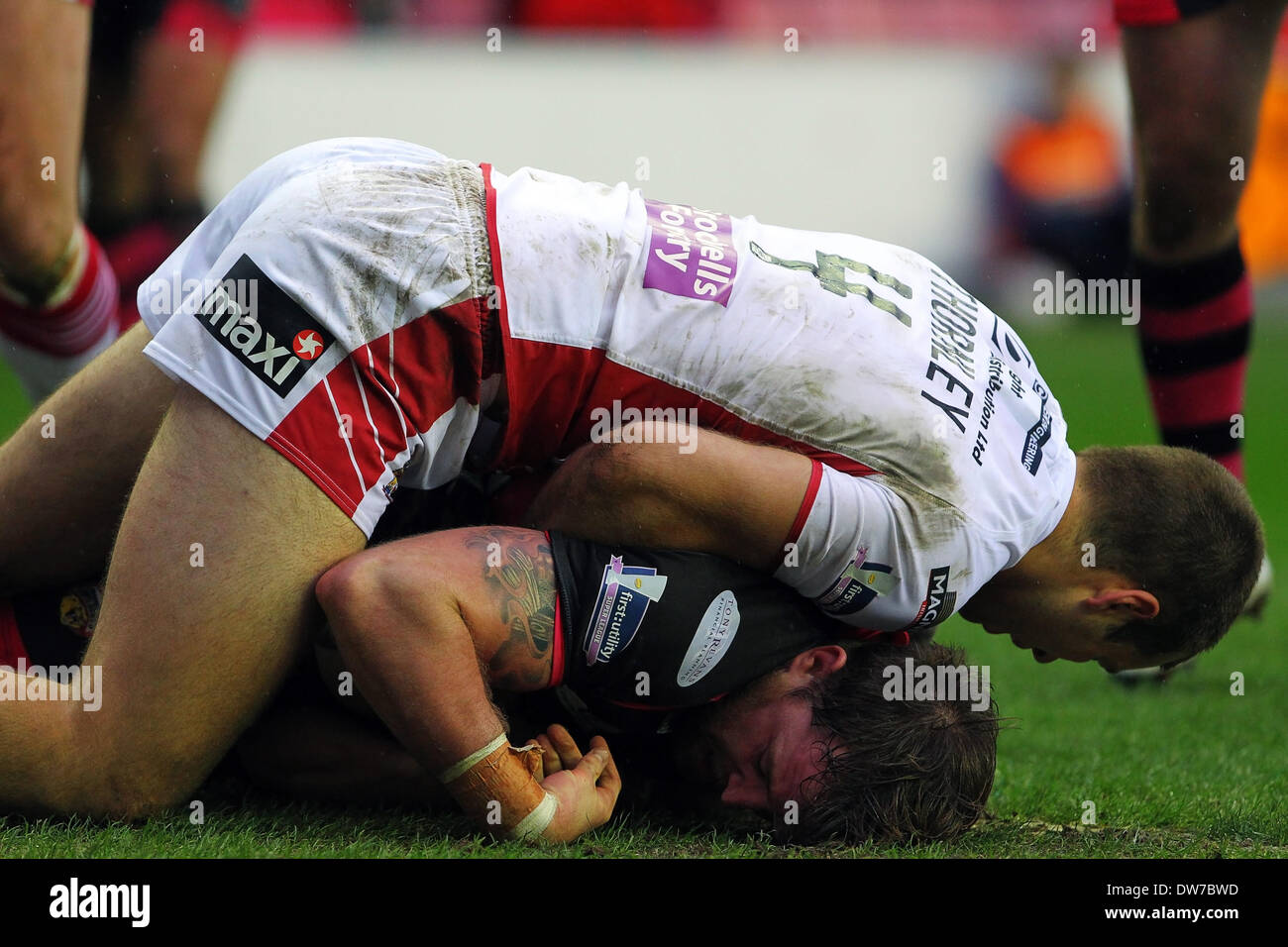 02.03.2014 Wigan, England. Danny Kirmond of Wakefield Wildcats dives across the line to score a try during the Super League Rugby game between Wigan Warriors and Wakefield Wildcats from the DW Stadium. Stock Photo