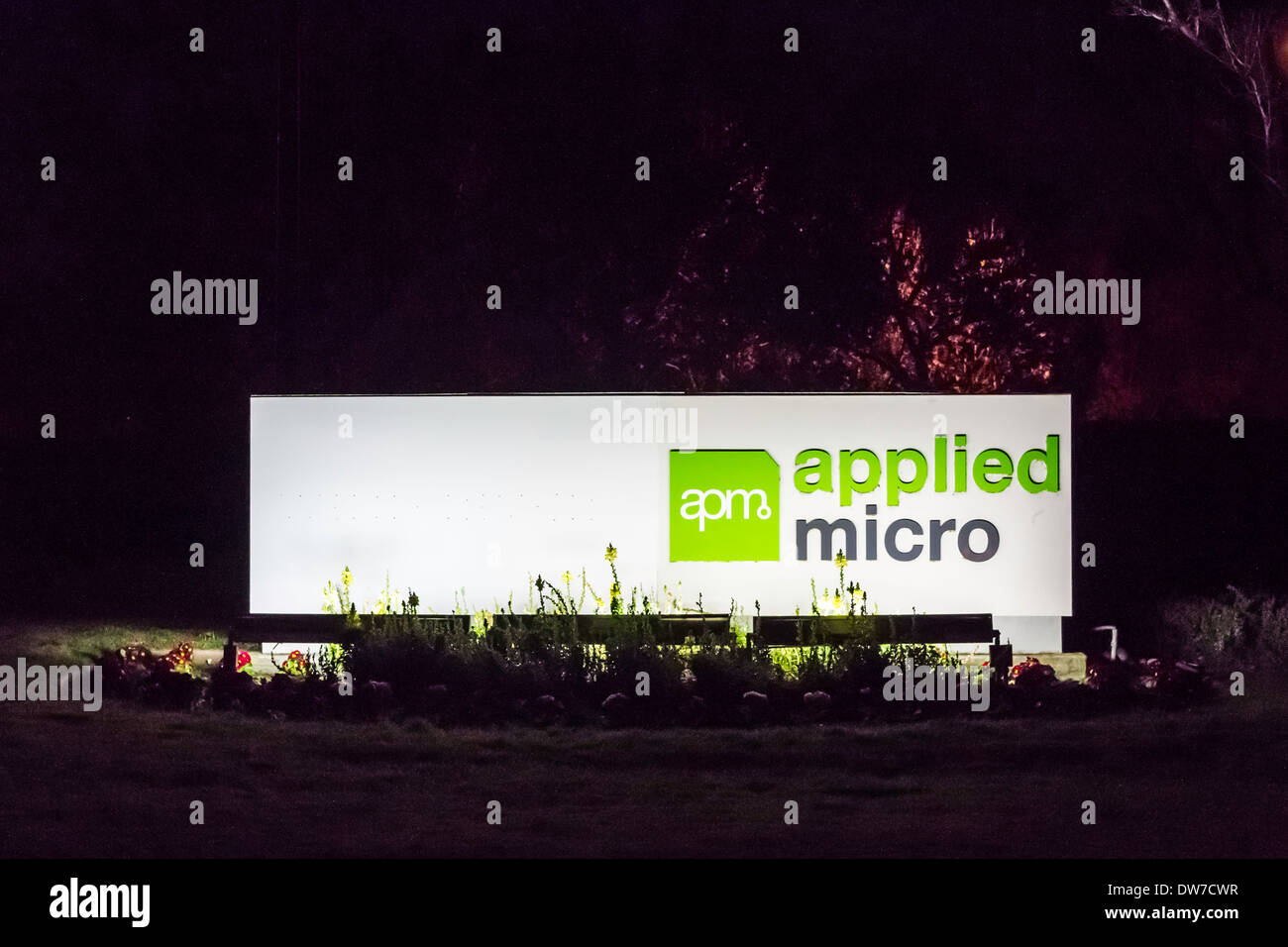 An Applied Micro Sign at night in San Jose California Stock Photo