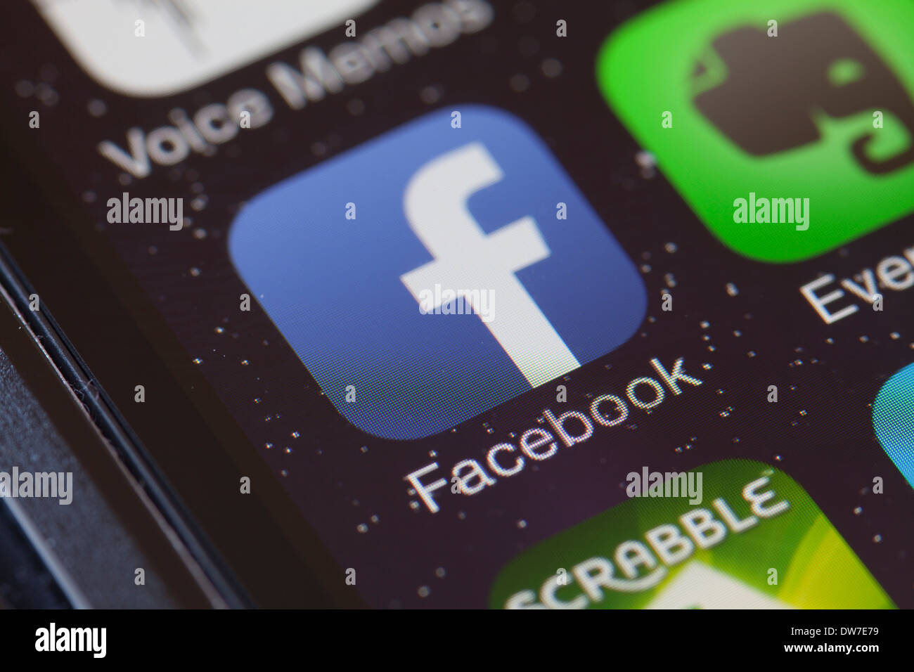 Facebook app icon on mobile phone. Stock Photo