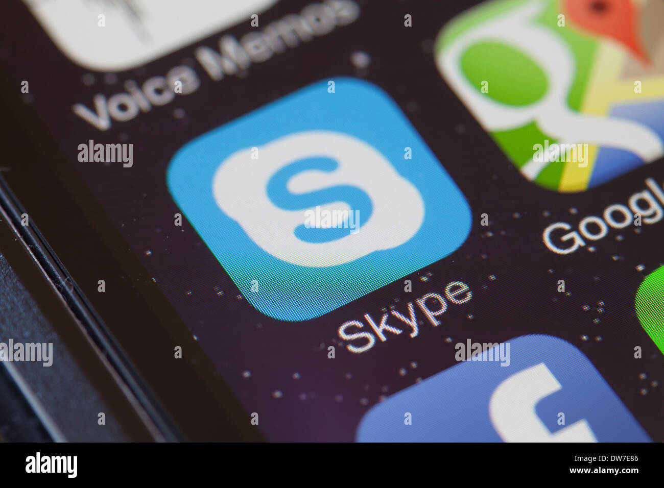 Skype app icon on mobile phone. Stock Photo